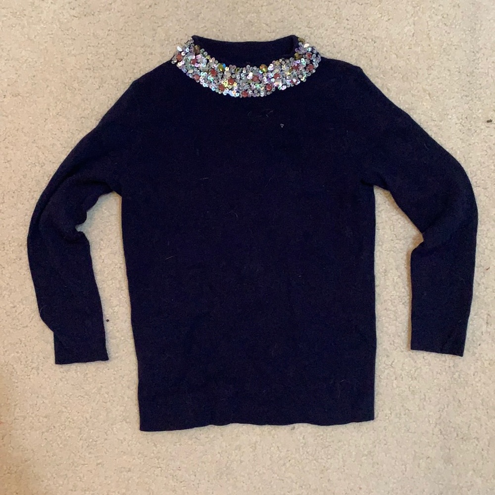blue sweater with jewel collar